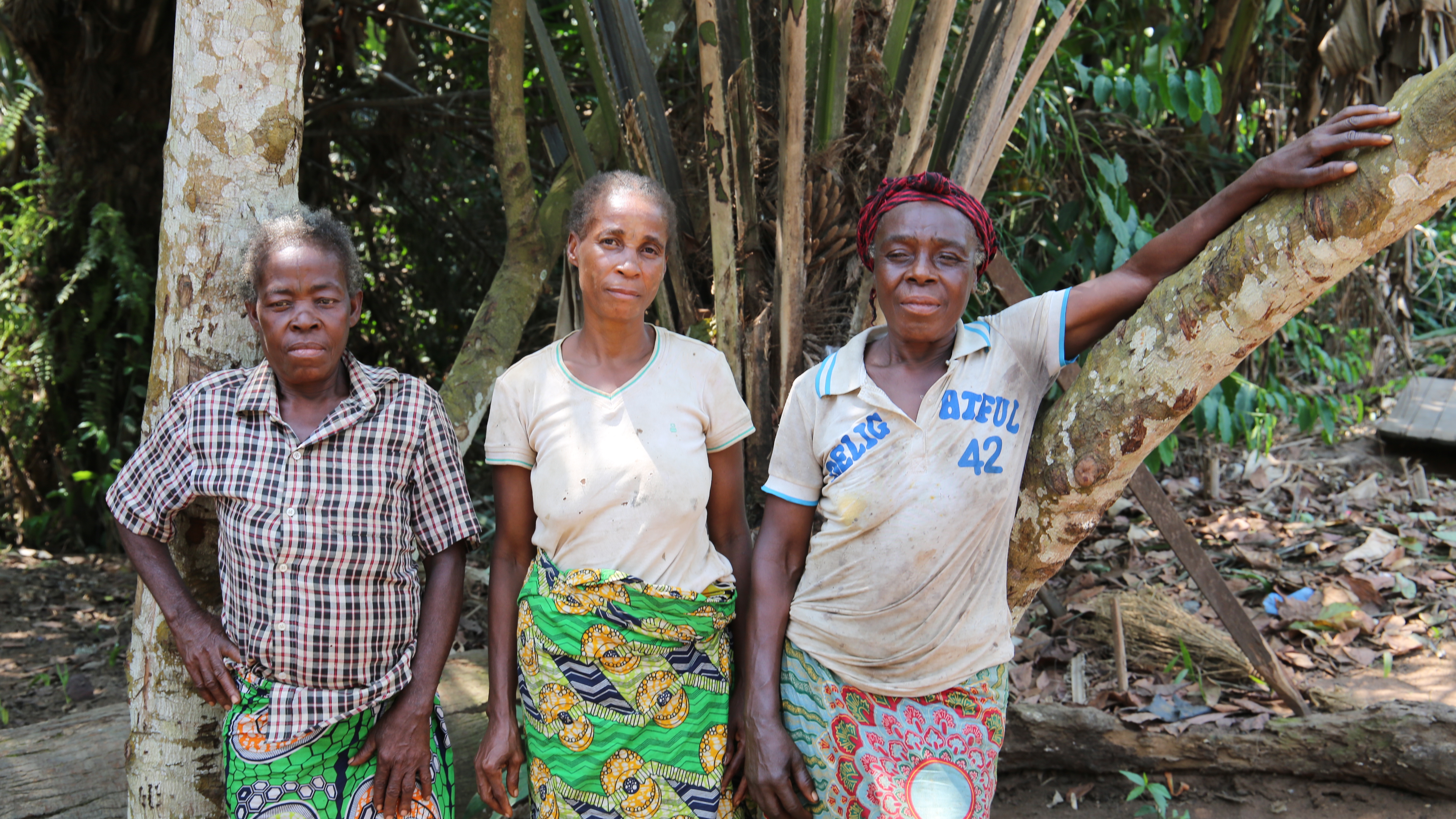 Three Baaka women in their village near Ngombe 