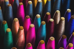 Spools of multicolored yarn