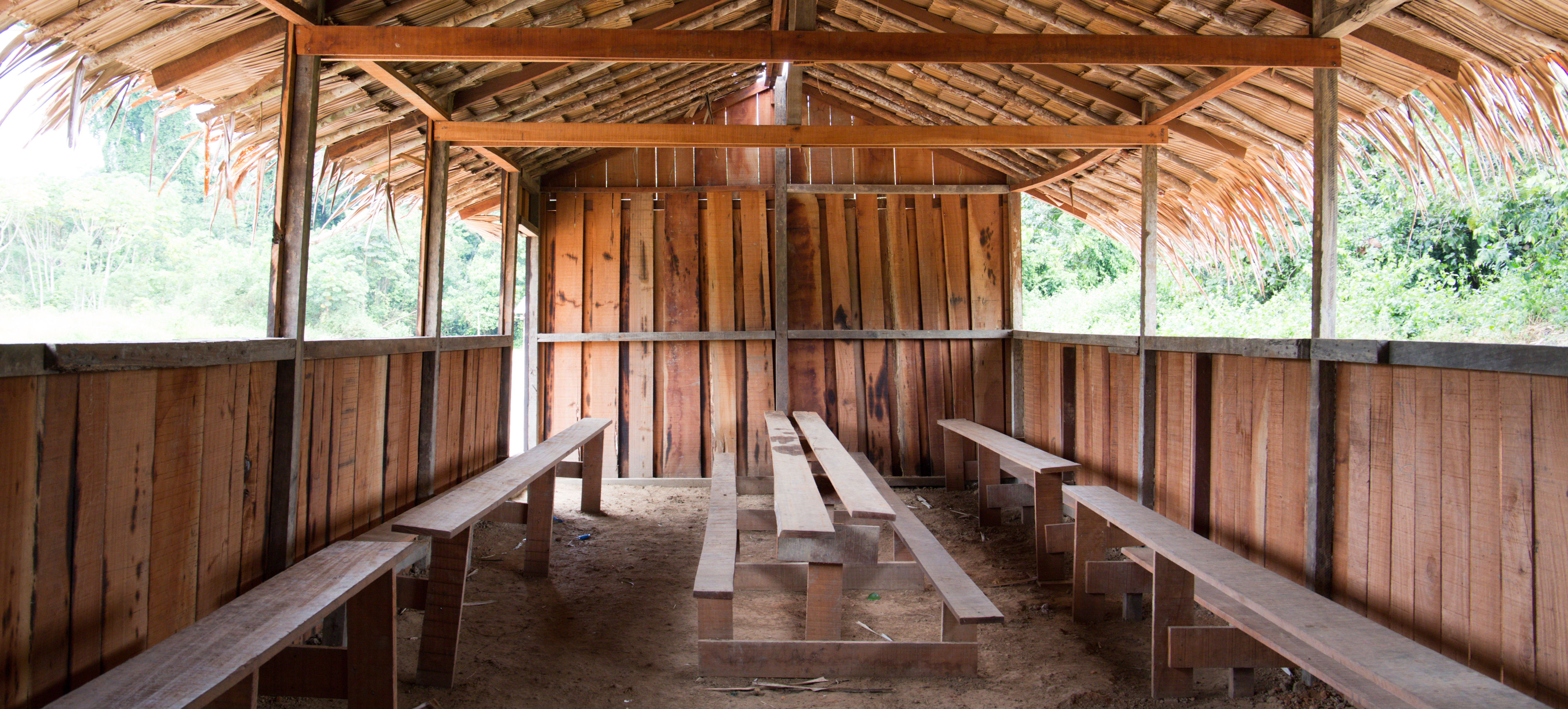 school lunch area in wooden shelter area congo
