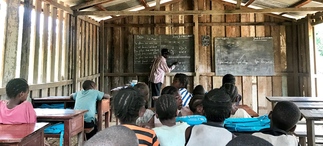 School and class being taught in congo