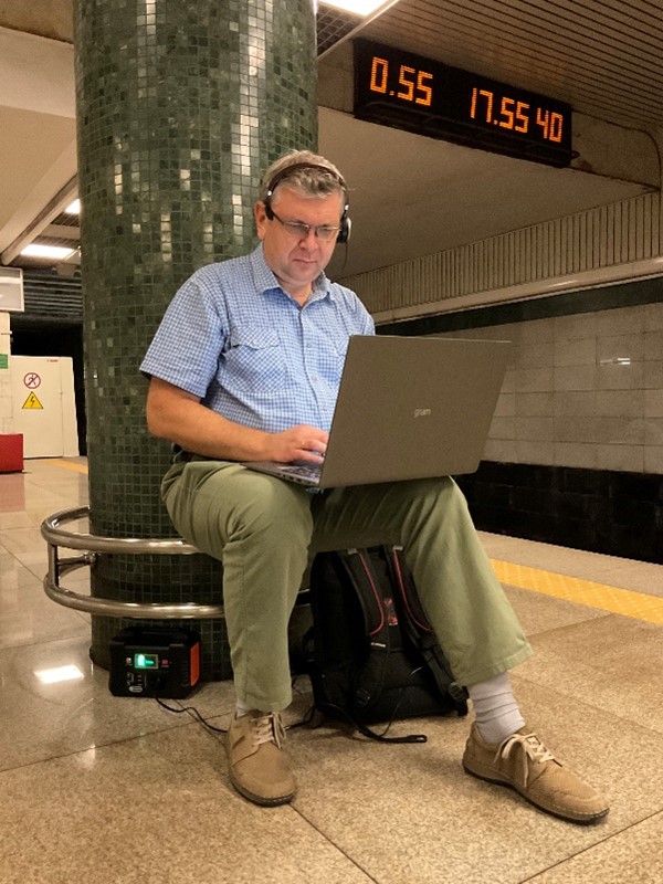 Pavlo Kravets of FSC Ukraine working in a metro station during air raid
