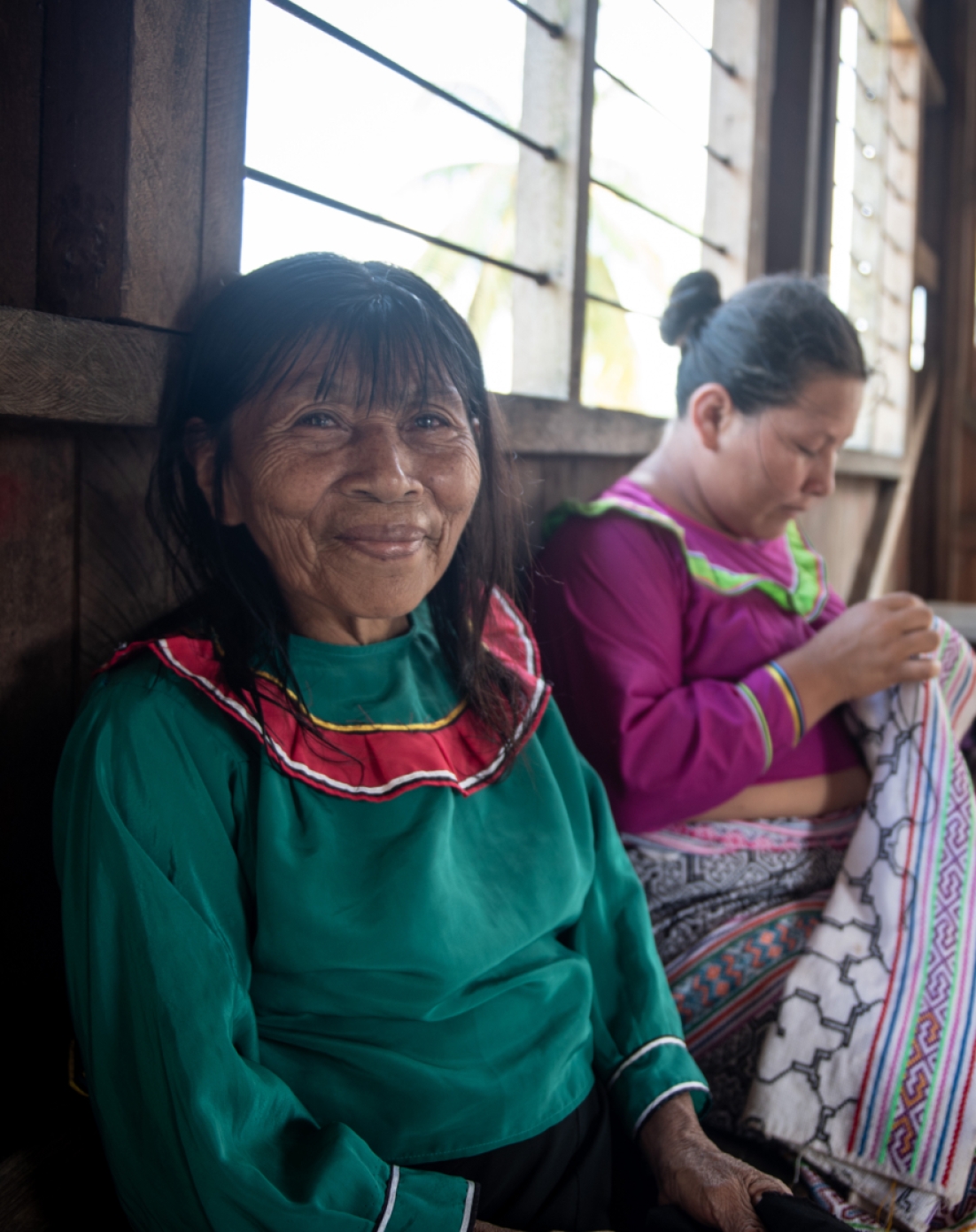 Women working on woven fabric
