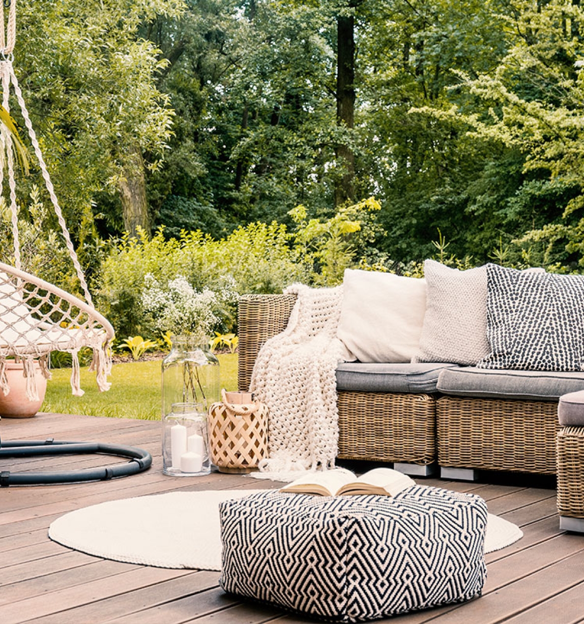 Outdoor patio furniture with forest background