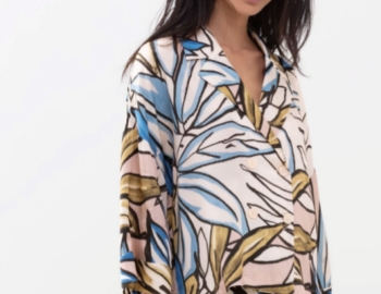 Woman modeling multicolored print pajama shirt