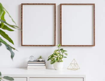 FSC-certified wooden frames hanging on wall