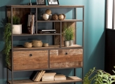 Wooden and metal shelving unit with drawers and decor